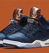 Image result for Nike Fermi 5S Gold