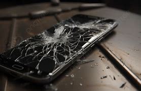 Image result for Cracked Phone On the Table