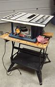 Image result for Black and Decker Rolling Table Saw Stand