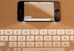 Image result for Apple iPhone 5 Projected Keyboard