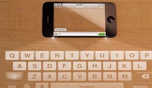 Image result for iPhone 5 Projection Keyboard