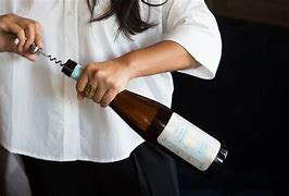Image result for Wine Opening