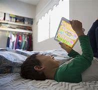 Image result for Child Watching iPad