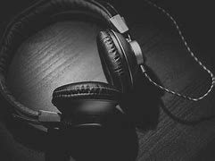 Image result for Headphones On Table