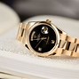 Image result for Black and Gold Rolex