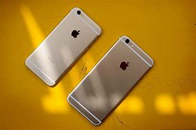 Image result for iPhone 6 beside iPhone SE