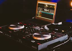Image result for 2 Turntables and a Mixer