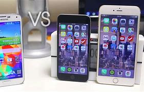 Image result for Galaxy Mega vs iPhone 6 Plus