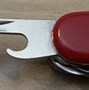 Image result for Swiss Army Knife Can Opener