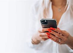 Image result for Back View of Woman Holding Phone