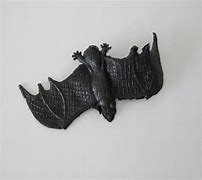 Image result for Black Rubber Bat Toy