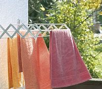 Image result for Wall Mounted Retractable Clothes Drying Rack