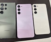 Image result for iPhone 13 Mini vs S23 Size