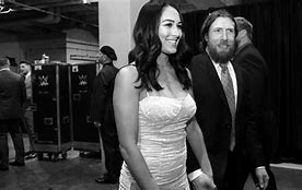 Image result for Brie Bella Daniel Bryan Remove Shoe