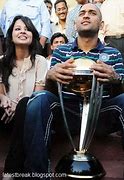 Image result for MS Dhoni and Sakshi World Cup 2011 Photo