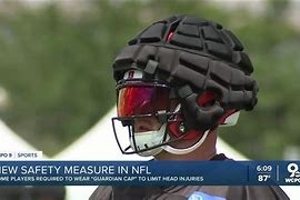 NFL to allow players to wear soft-shell helmet covers 的图像结果