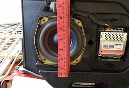 Image result for 2003 Mazda Protege5 Spare Tire Subwoofer