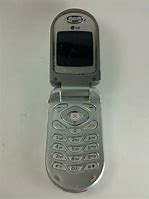 Image result for Old LG Flip Cell Phone