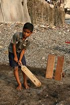 Image result for Indian Kids Playing Cricket in the Street