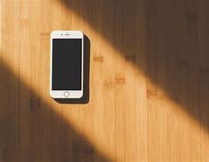 Image result for iPhone 11 On Wood Table