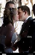 Image result for Bride and Groom Kissing at Altar