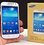 Image result for Galaxy S4 Mini Next to an iPhone 5S