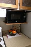 Image result for Compact Countertop Microwave