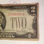Image result for two dollar bills red seals