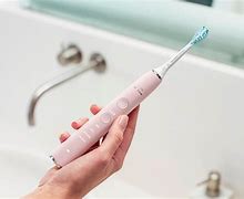 Image result for Philips Sonicare Pink Toothbrush