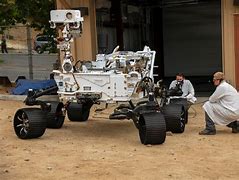 Image result for Perseverance Rover Next to Human