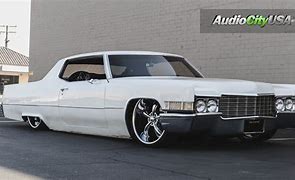Image result for Cadillac DeVille Chrome Rims