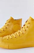 Image result for Chuck Taylor Sneakers