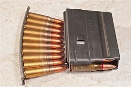 Image result for Round Clip Gun