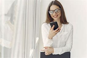 Image result for Woman Holding Smartphone