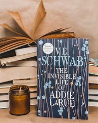 Image result for The Secret Life of Addie LaRue Wooden Ring in Book