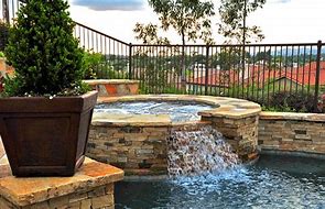 Image result for Pool with Hot Tub Waterfall