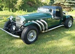 Image result for Antique Car Excalibur