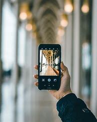 Image result for Picture of an Person Using Phone