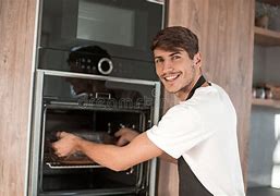 Image result for Man Standing in Front of Oven