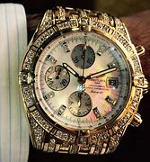 Image result for Gold Watch with Diamonds