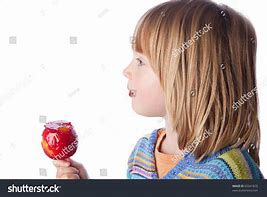 Image result for Child Eating Toffee Apple