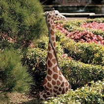 Image result for Giraffe Sculpture Plants