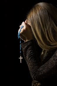 Image result for Woman Praying with Rosary