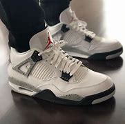 Image result for Jordan 4 White Cement On Feet