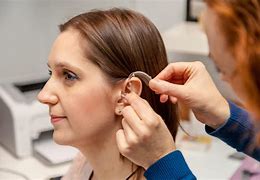 Image result for hearing aids fitting