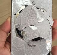 Image result for iPhone Broken Back Glass Stock Image