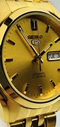 Image result for Seiko Solar Watches for Men Gold Band White Face