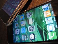 Image result for Two iPhones Making a Payment
