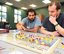 Image result for Photos of People Playing Board Games