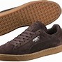 Image result for Puma Suede Tan and Black